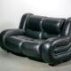 Black leather space age Italian 2 seater sofa