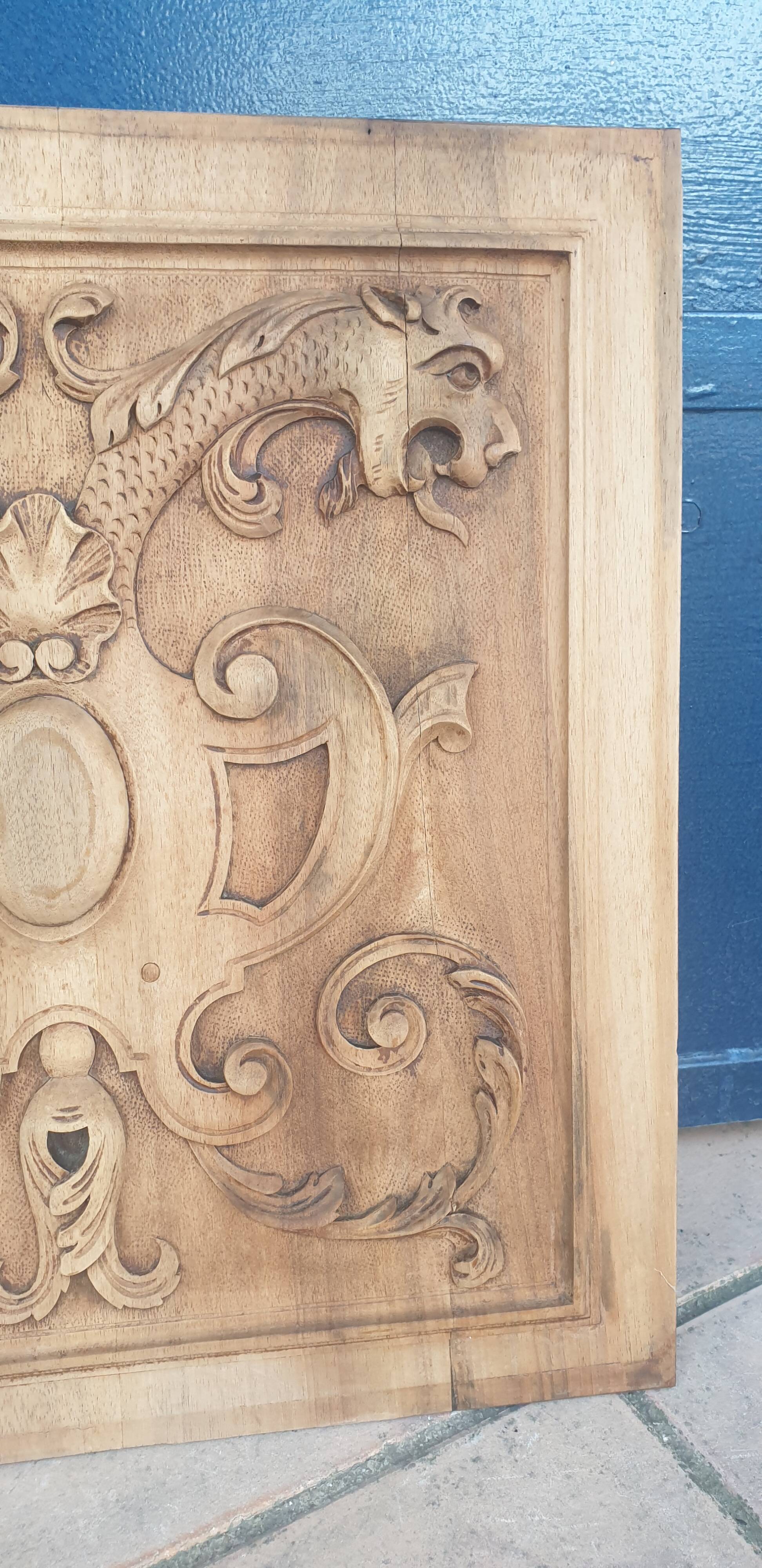 Pair of antique carved walnut panels