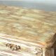 Beige and rust chest of drawers