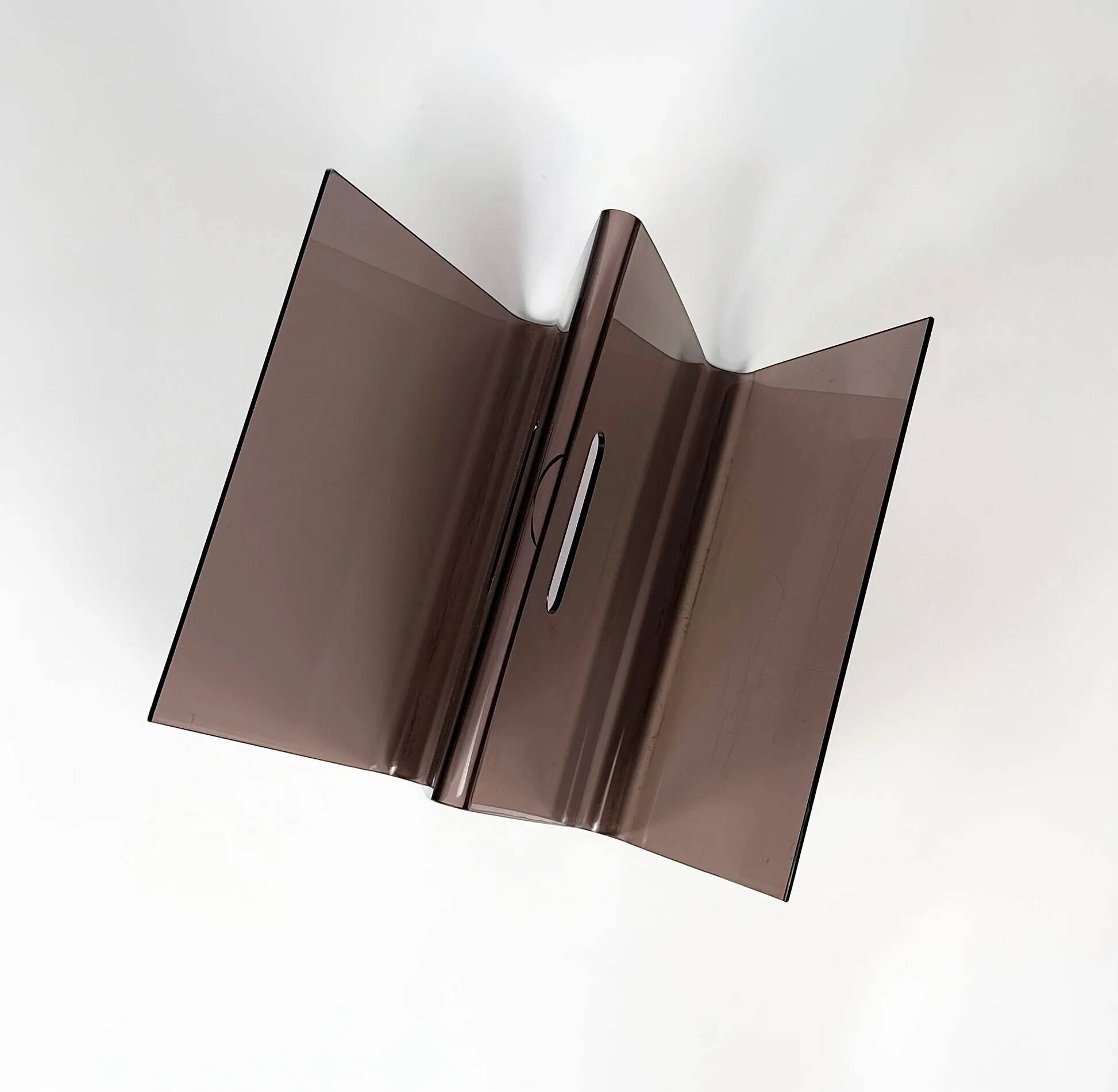 Smoked plexiglass magazine rack in the shape of a W — 1970s