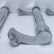 three long aluminum shop handles from the mid-20th century