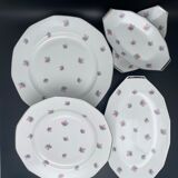 Porcelain serving dishes with small flowers and silver edging and