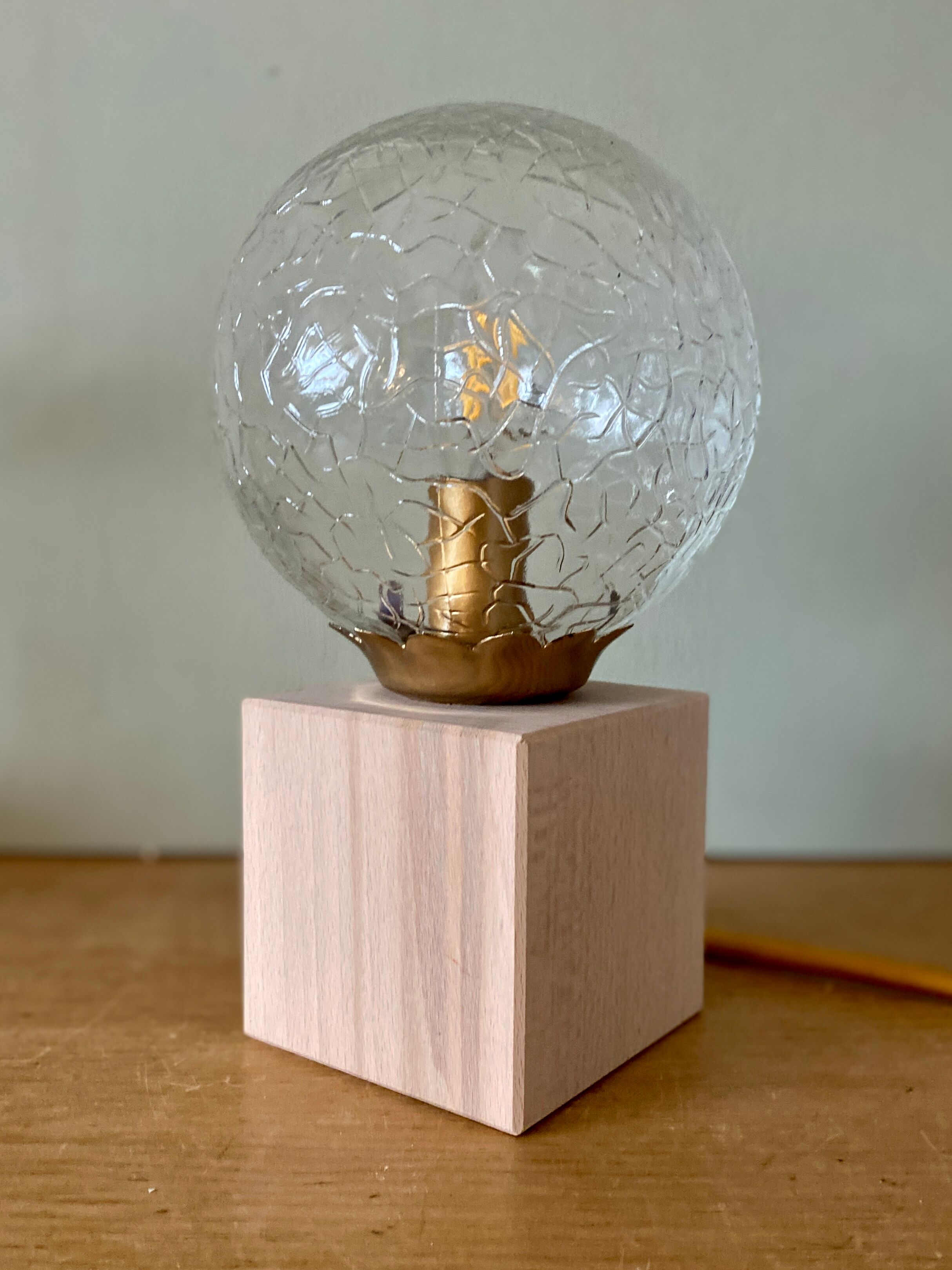 Vintage glass globe table lamp and wooden foot