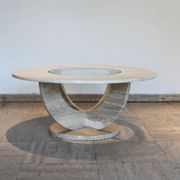 Table basse ronde travertin et vitre, Italie, 1970.