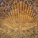 Asian coffee table carved with dragons and peacocks, Indonesia, early 20th century