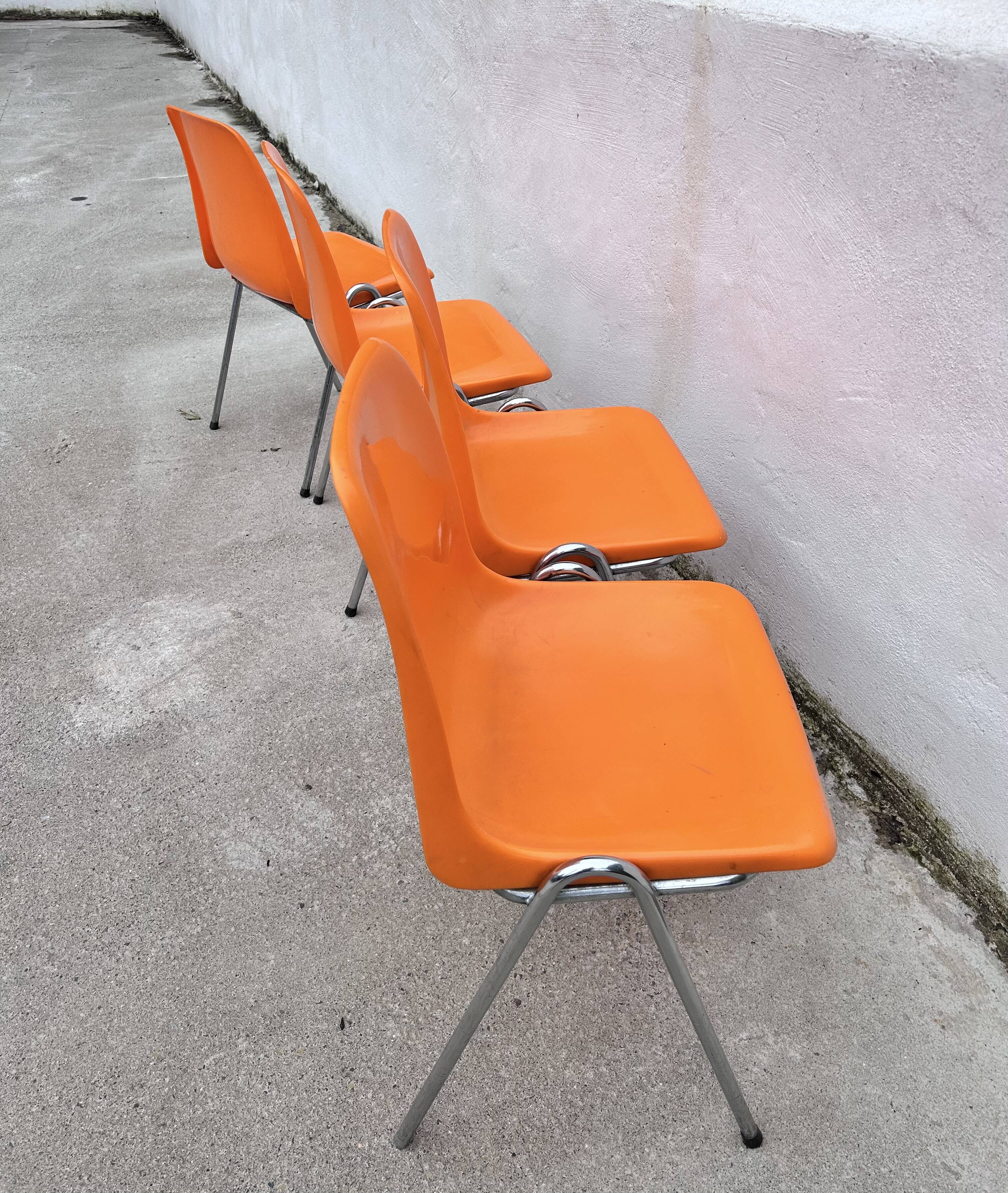 Orange plastic chairs