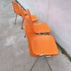 Orange plastic chairs