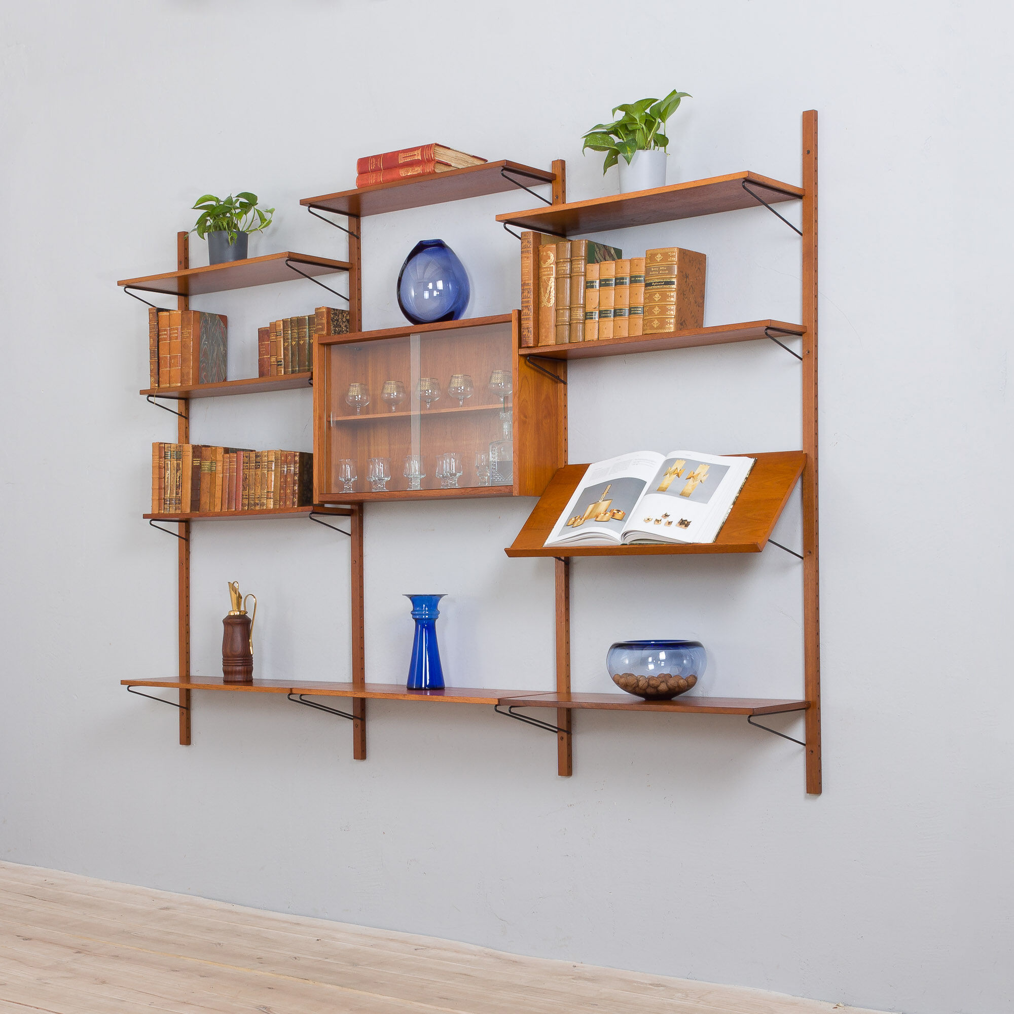 Danish mid century teak wall unit with magazine shelf and glass cabinet 1960/70s