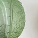 Art Deco green moulded glass globe table lamp with a brass base.