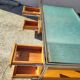 Bureau vintage design verre chrome double face en hêtre