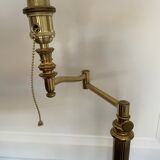 Articulated brass and gold metal floor lamp