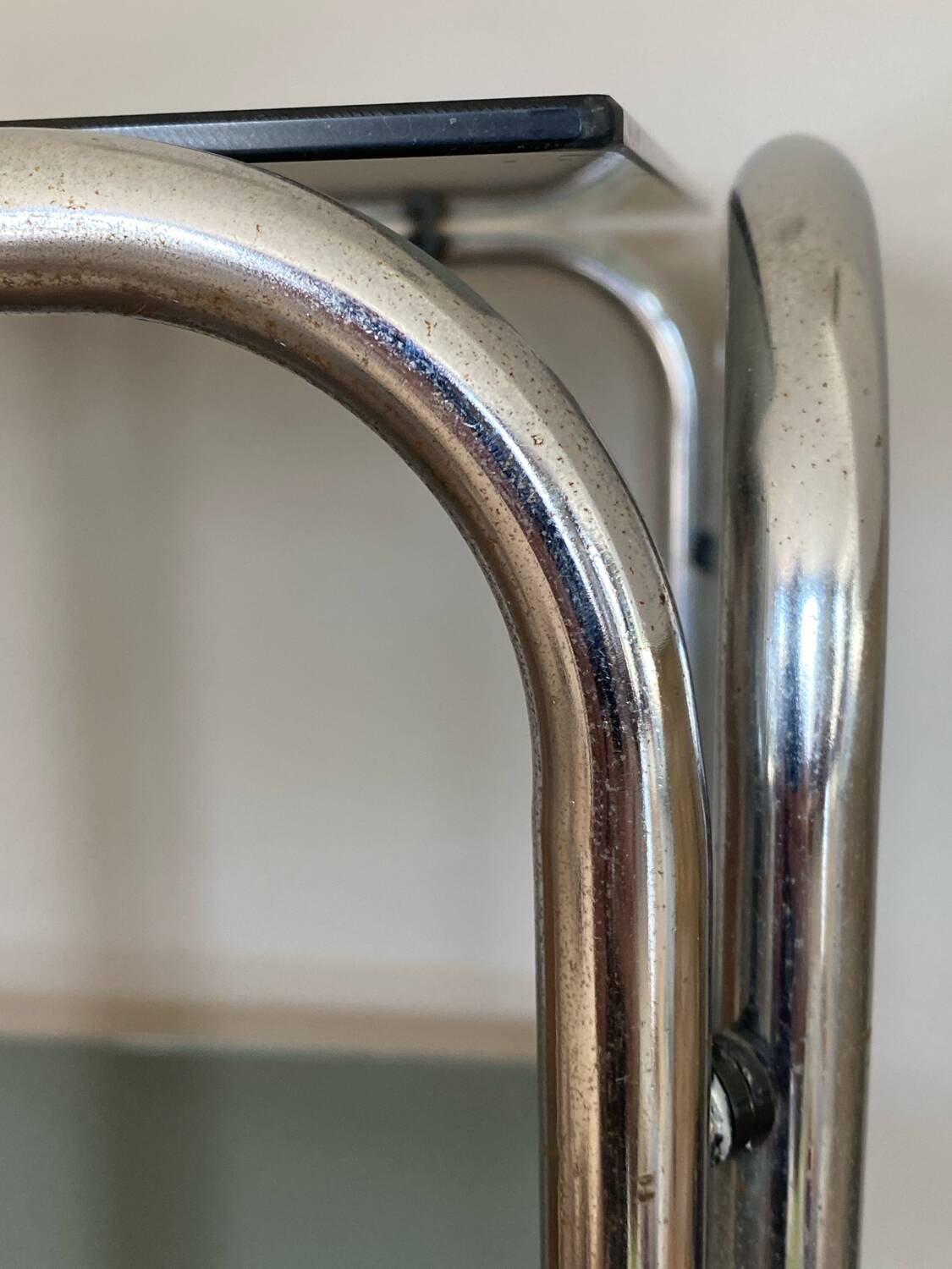 Chrome and smoked glass side table