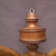 Old curved wooden wall mantle door has 3 THONET style patères