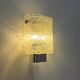Pair of chrome wall sconces with Murano glass, wall light, art of glass, interior decoration.