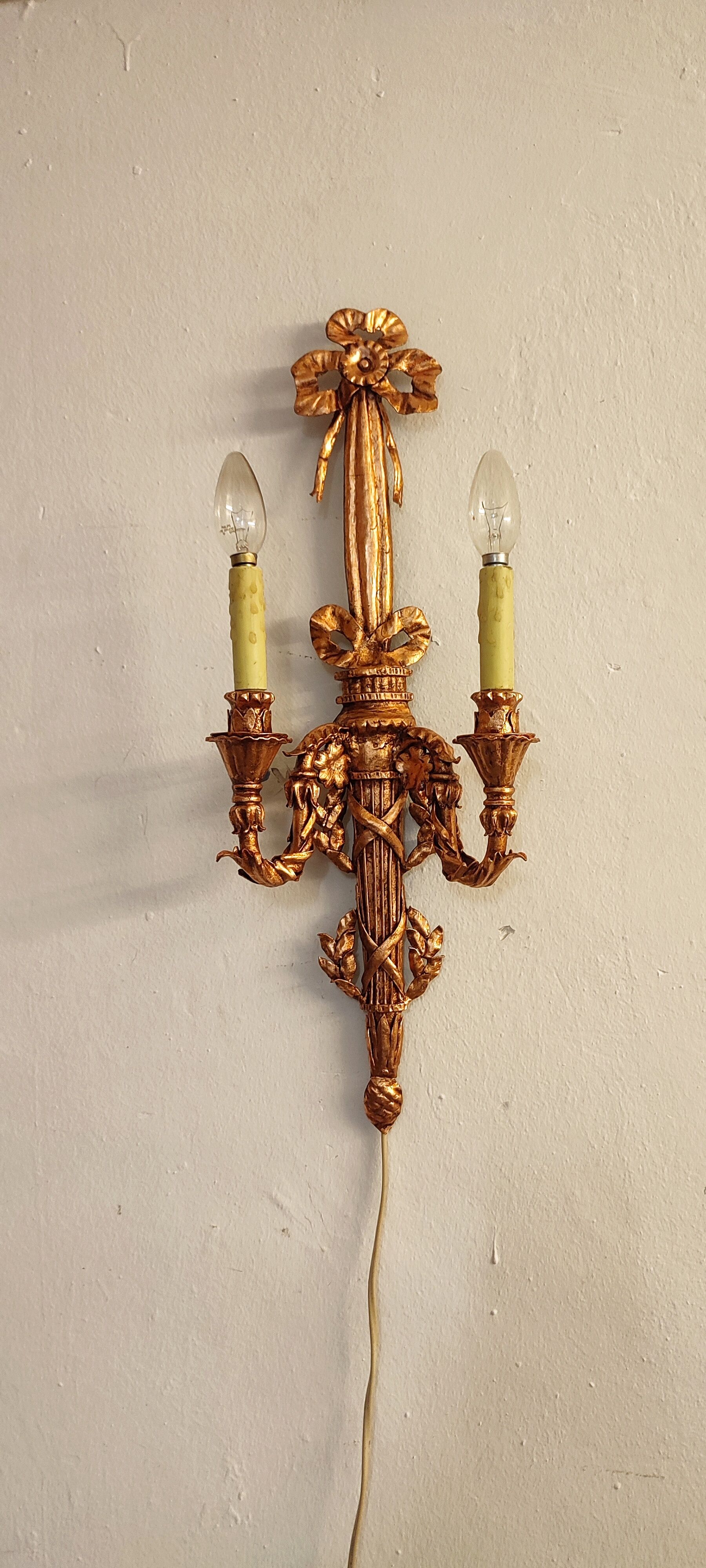Wall lamp wrought iron and gold leaf. France, 1950s.