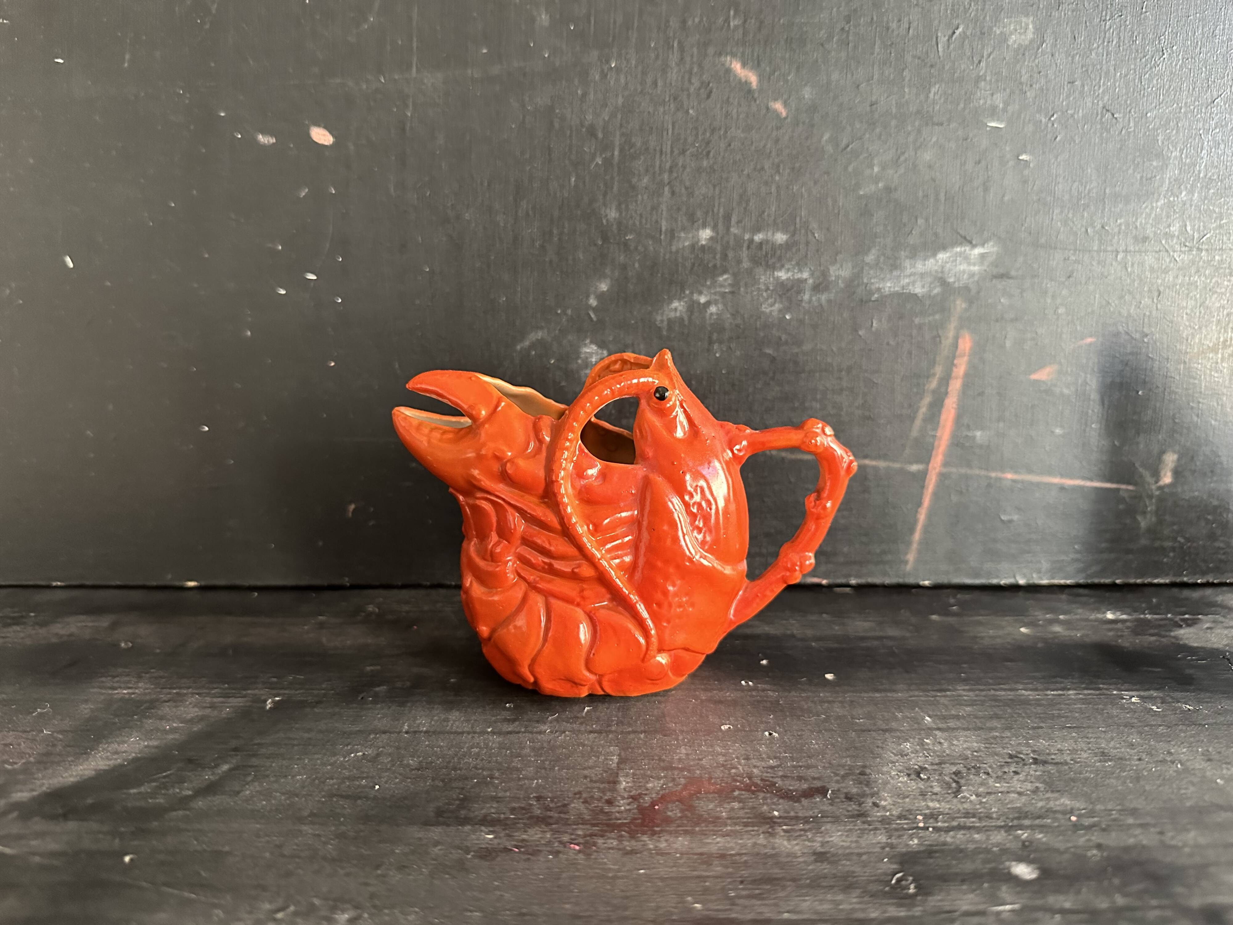 Antique ceramic lobster pitcher from the early 20th century.