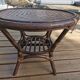 Round vintage coffee table in bombous and rattan