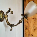 Bronze wall light with opaque glass tulip