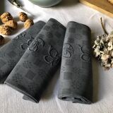 Suite of four napkins tinted in smoke grey