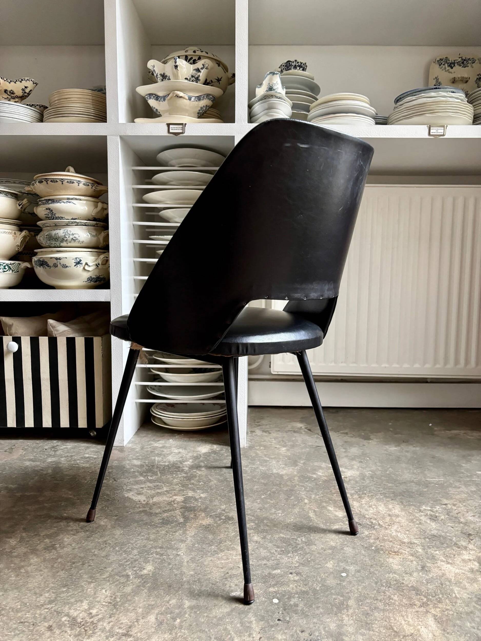Chair in black faux leather