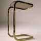 C. 1970 - Pair of side tables in gilded metal and smoked glass -