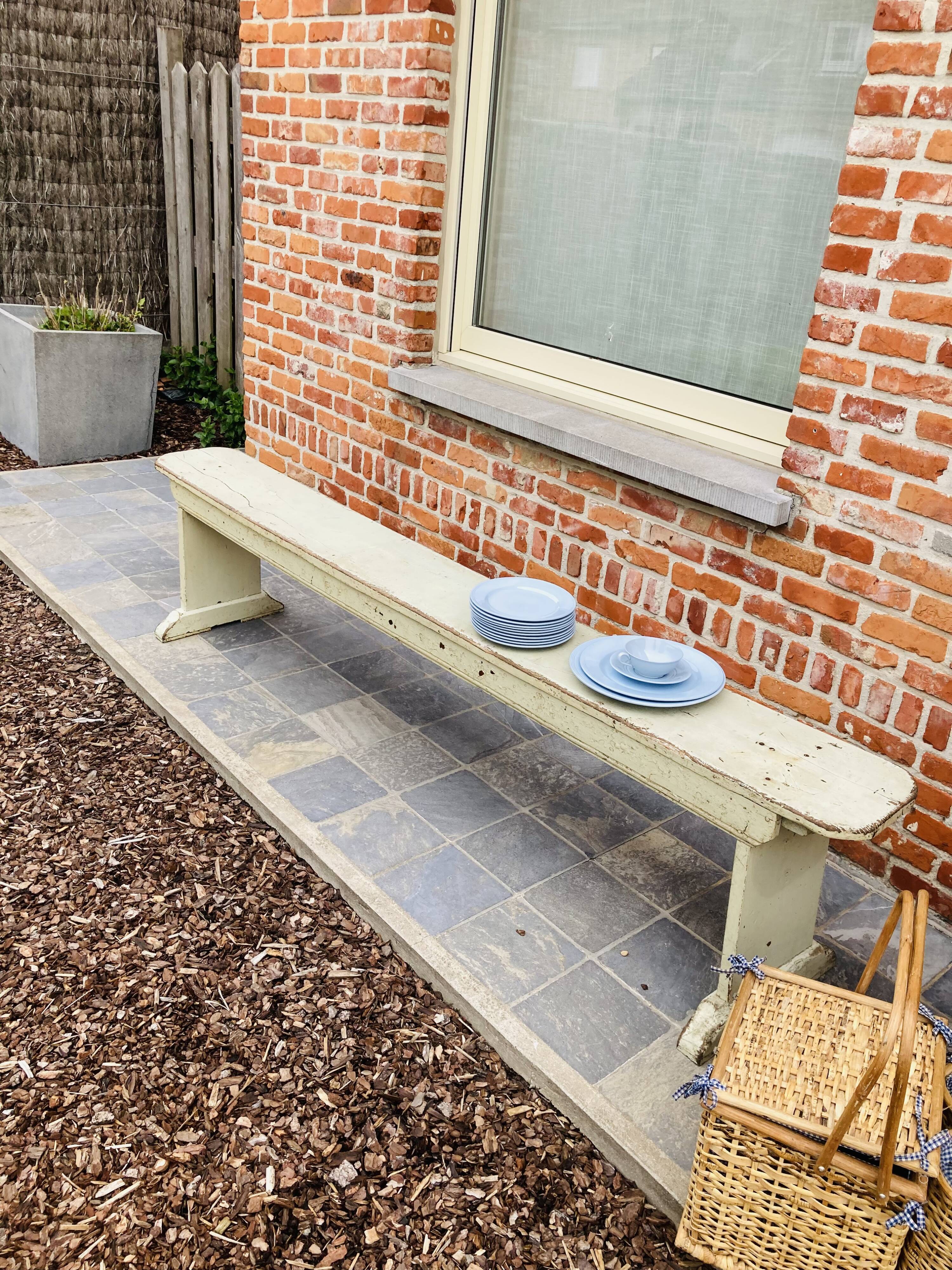 Old wooden bench painted in light green
