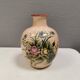 Italian vase from the 70s, in a delicate pink color with floral decoration.
