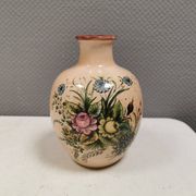 Italian vase from the 70s, in a delicate pink color with floral decoration.