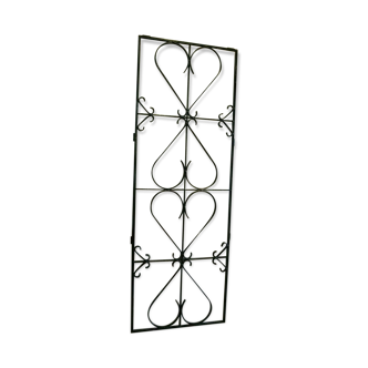 Grille de porte en fer forgé