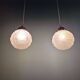 Art Deco trio of frosted glass pendants, 1920s-30s.