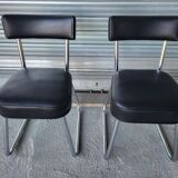 Pair of vintage black and chrome leatherette office chairs in very good condition