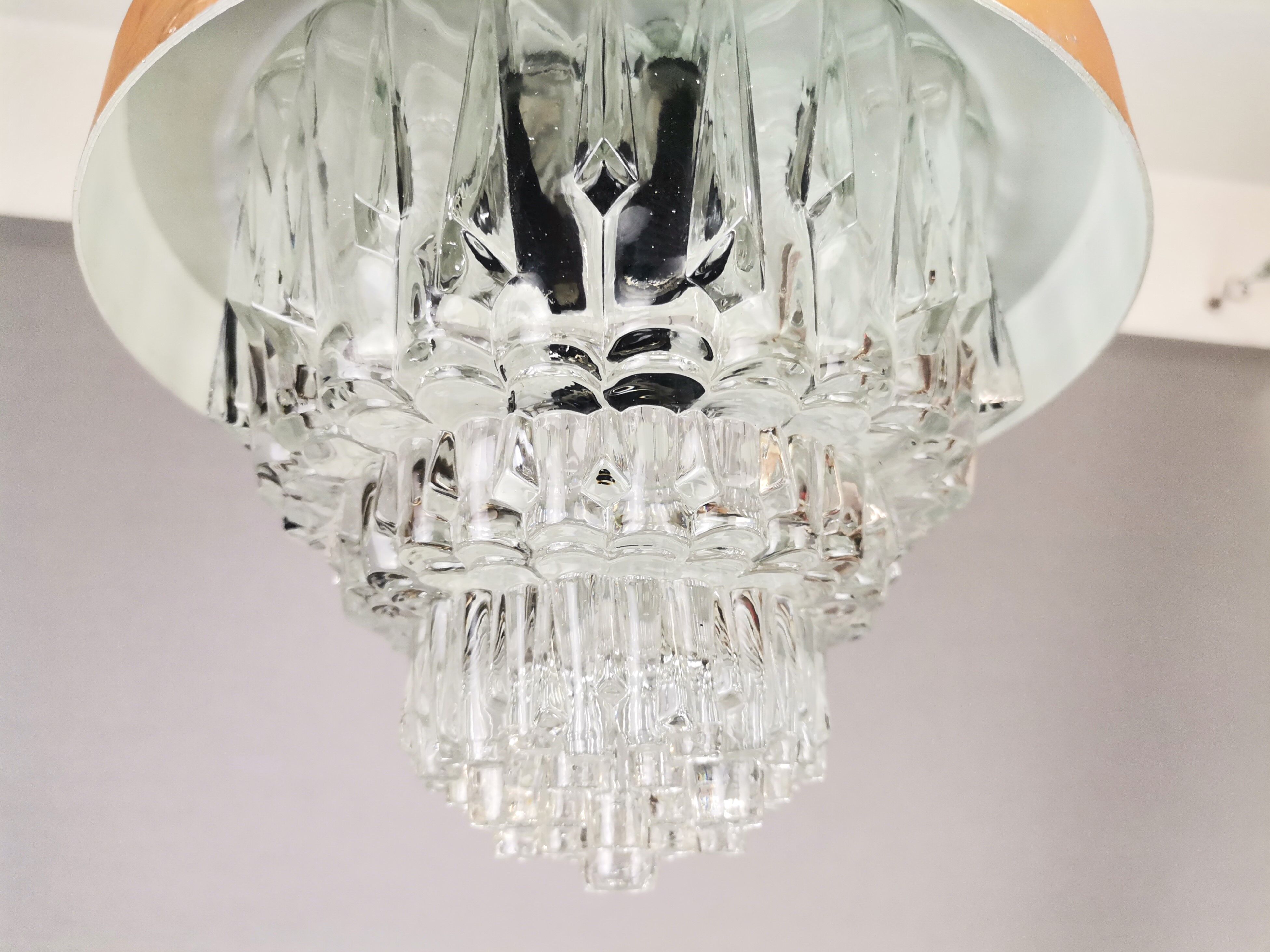 MidCentury Modern clear glass and copper colored aluminium hanging lamp, 1960s