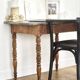 Curved black lacquered wooden armchair in Thonet style