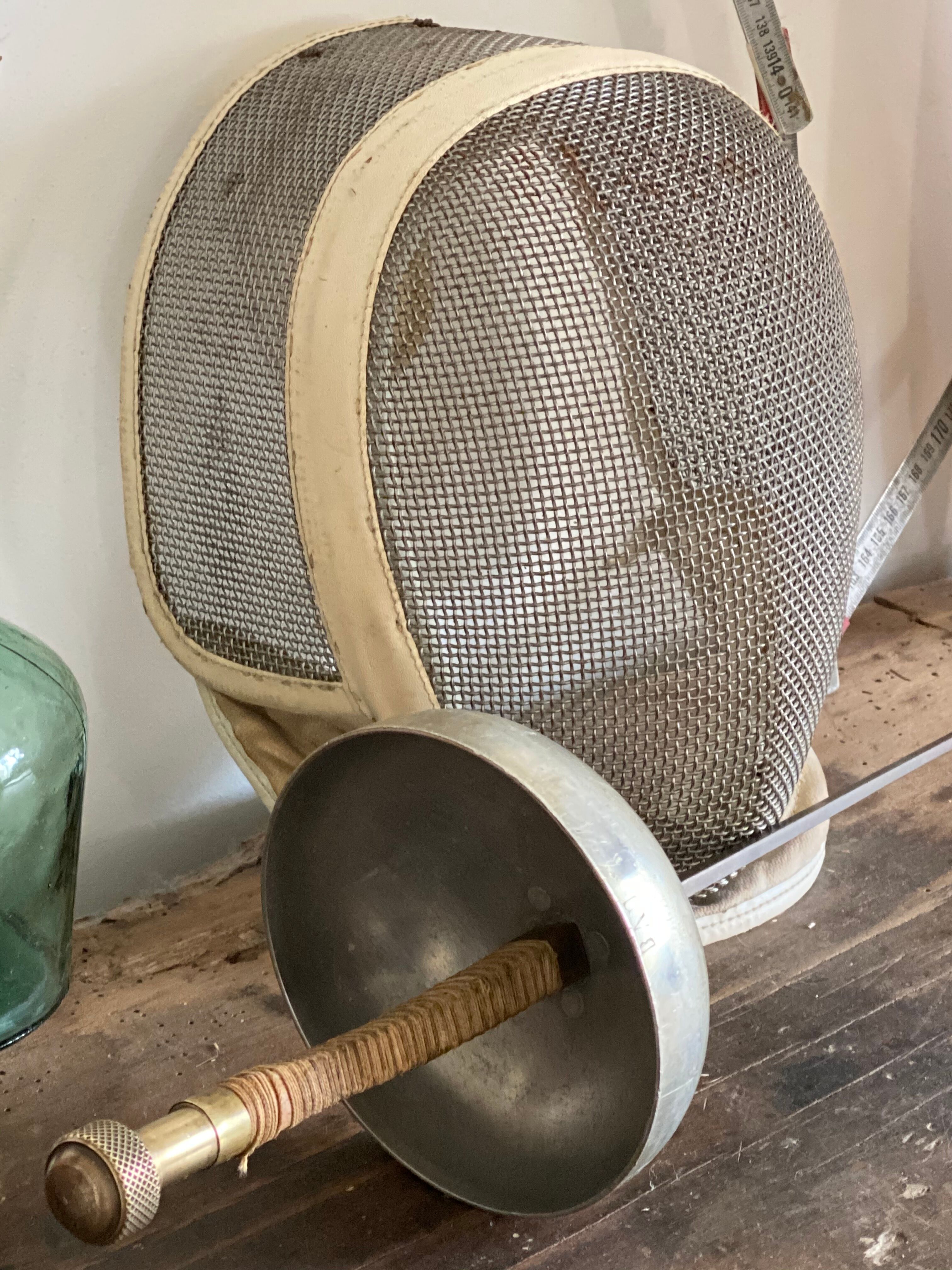 Old fencing mask set and its foil