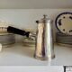Christofle silver-plated chocolate pot and coffee pot with a blackened wooden handle.