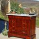 Antique mahogany chest of drawers with white marble.