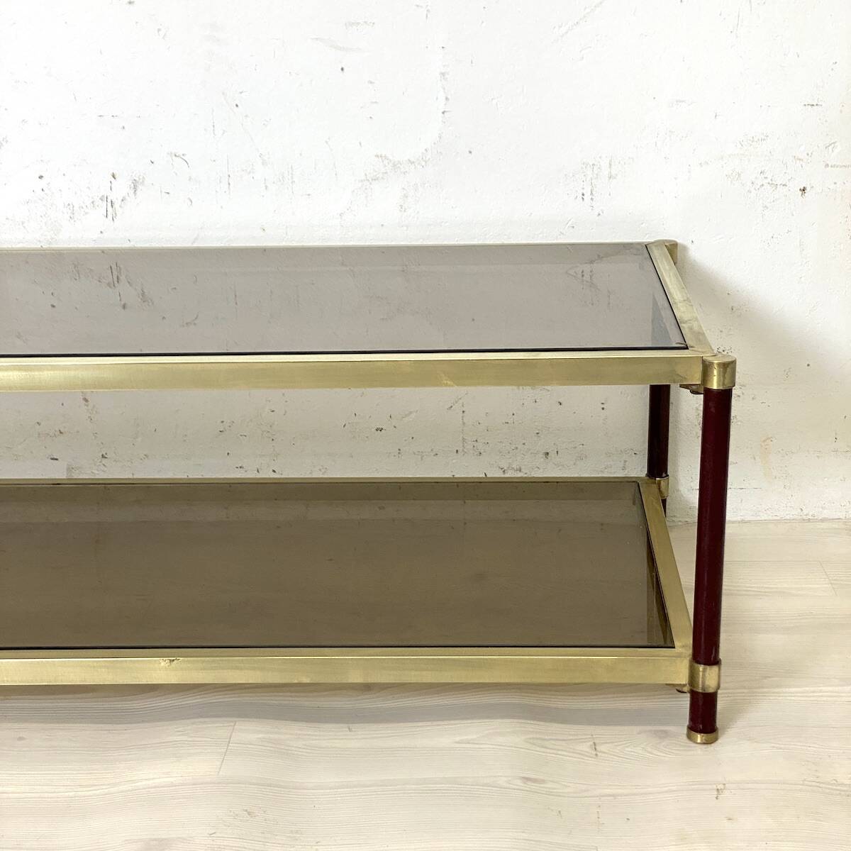 Vintage 1970s gold metal and smoked glass coffee table.