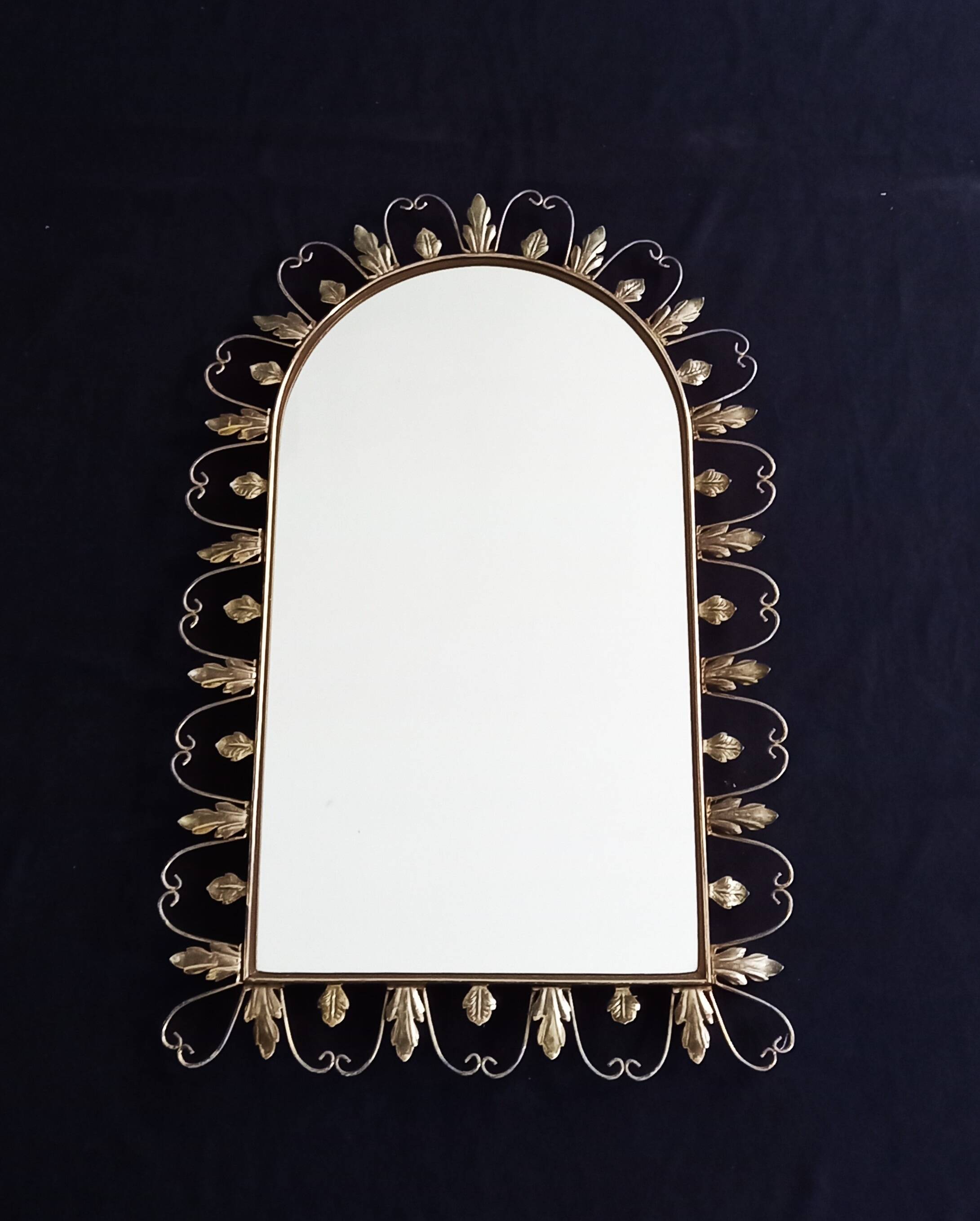 Large arched mirror with acanthus leaves and scrolls in gold metal from deknudt, 1960s