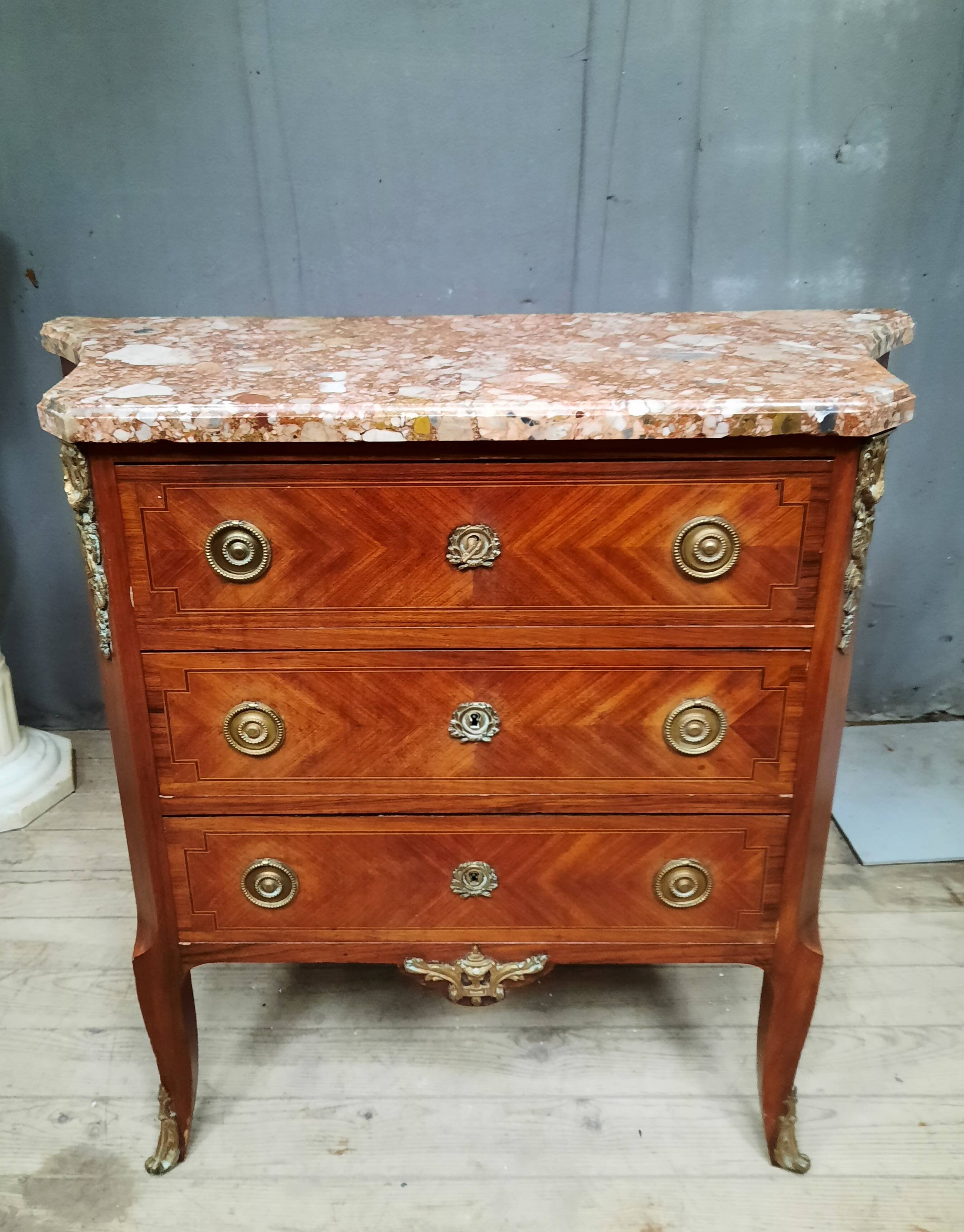 Transitional marquetry chest of drawers