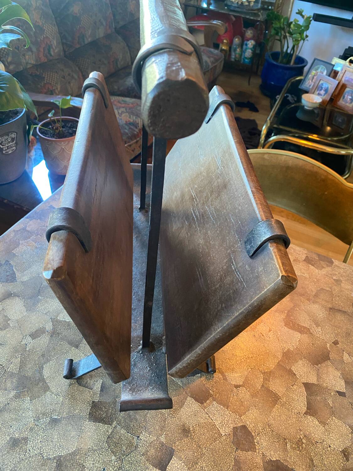 Vintage brutalist magazine rack.