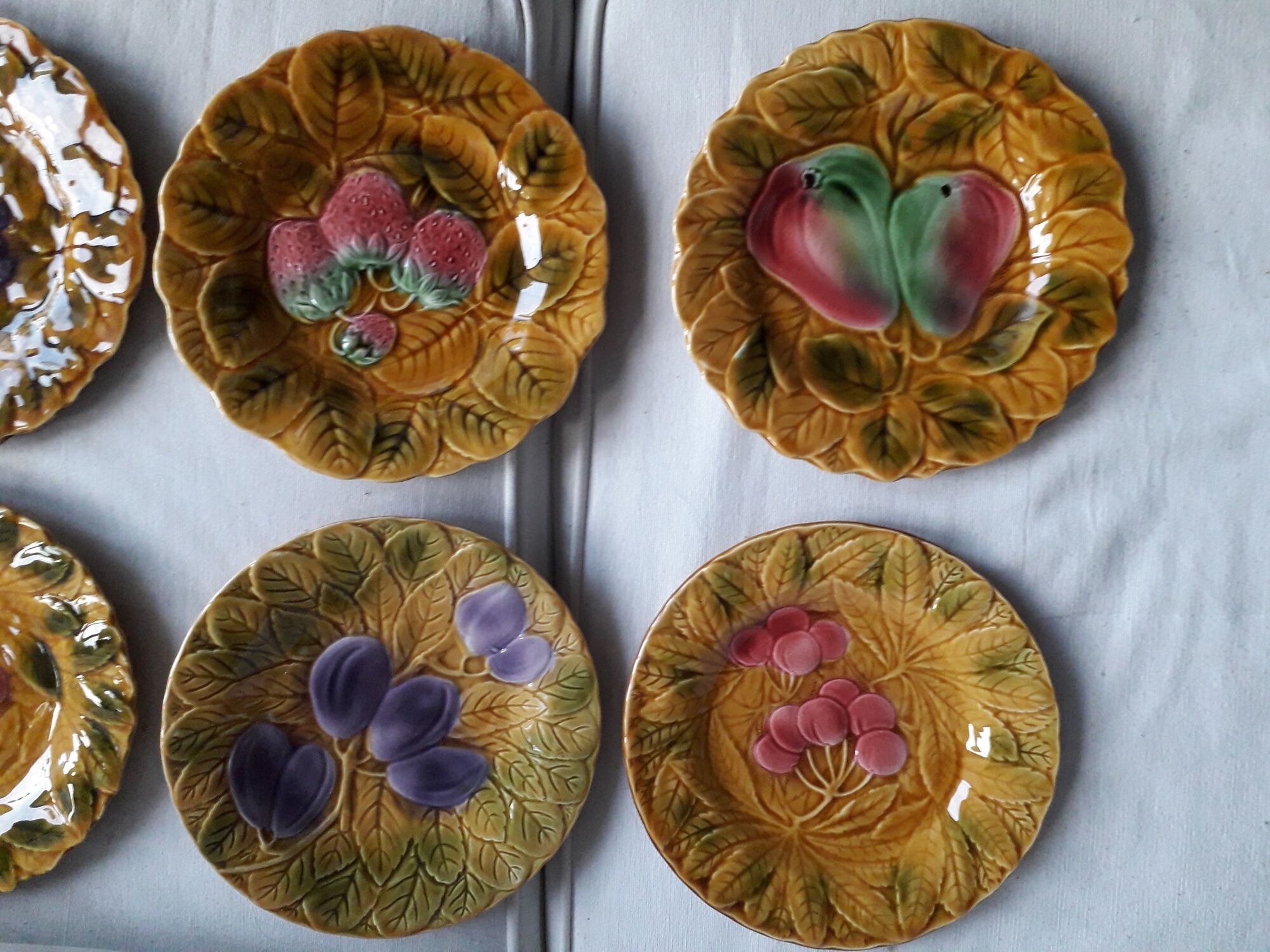 Set of 10 Sarreguemines dessert plates in slurry decorated fruit