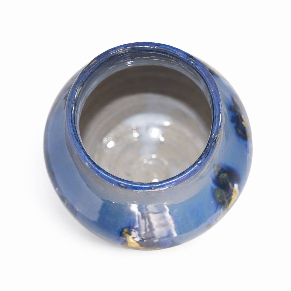 Baluster vase in Belgian ceramic with flowing blue and yellow glazes.