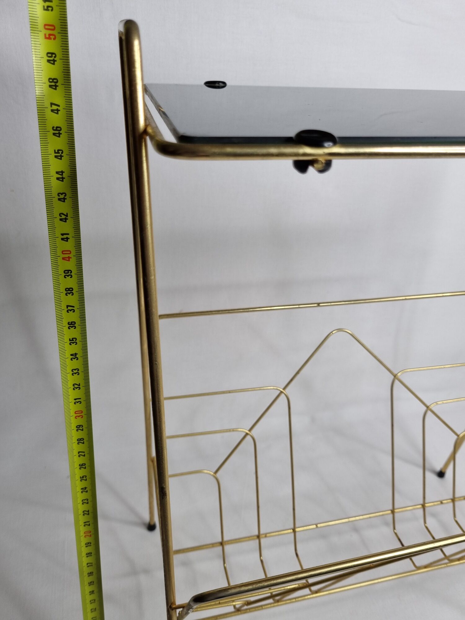 Vintage magazine shelf in glass and gilded metal
