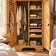 Parisian Art Deco wardrobe, renovated with raw wood.