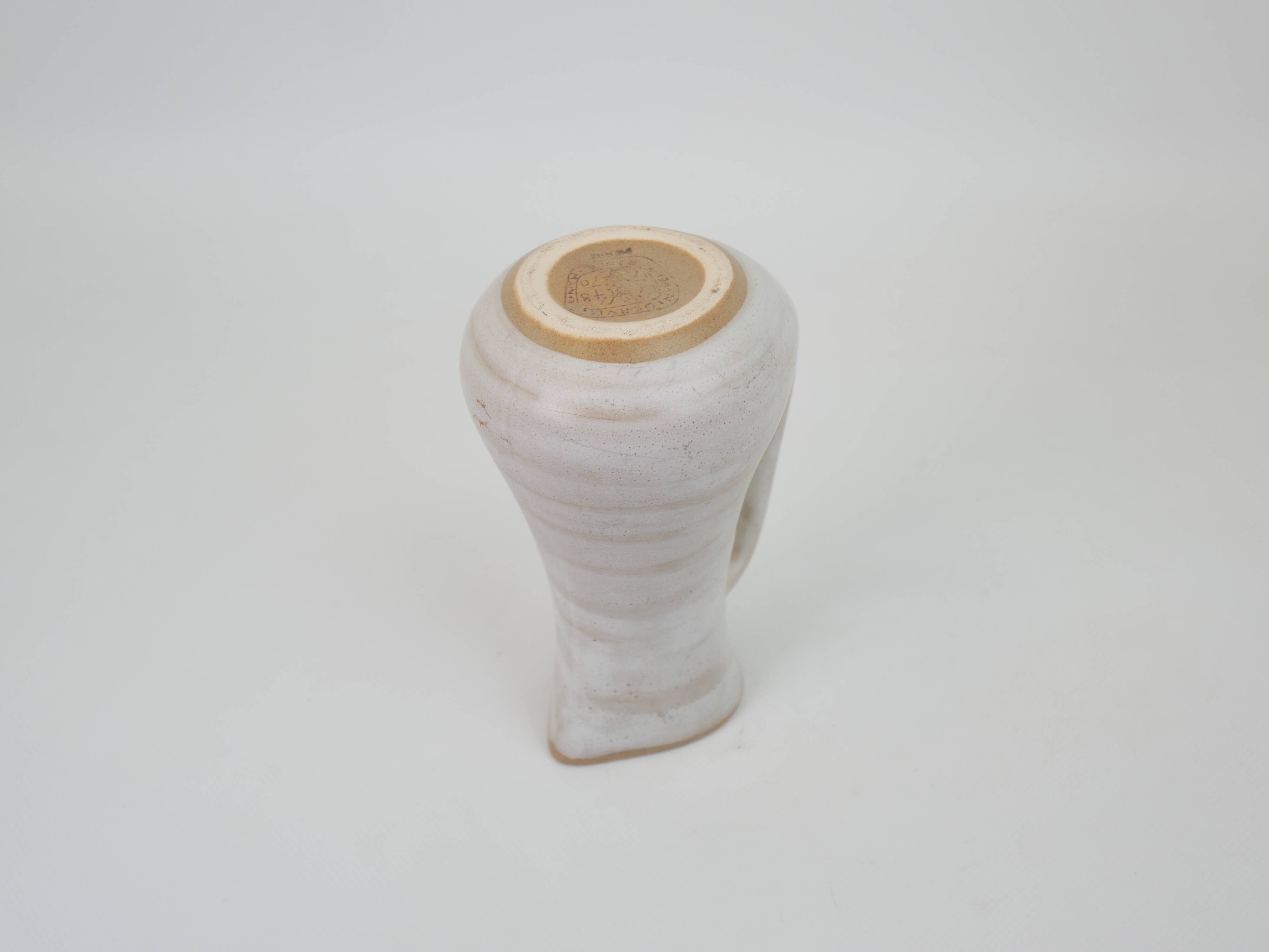 Signed white beige ceramic pitcher