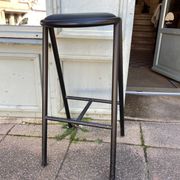 Black metal bar stool