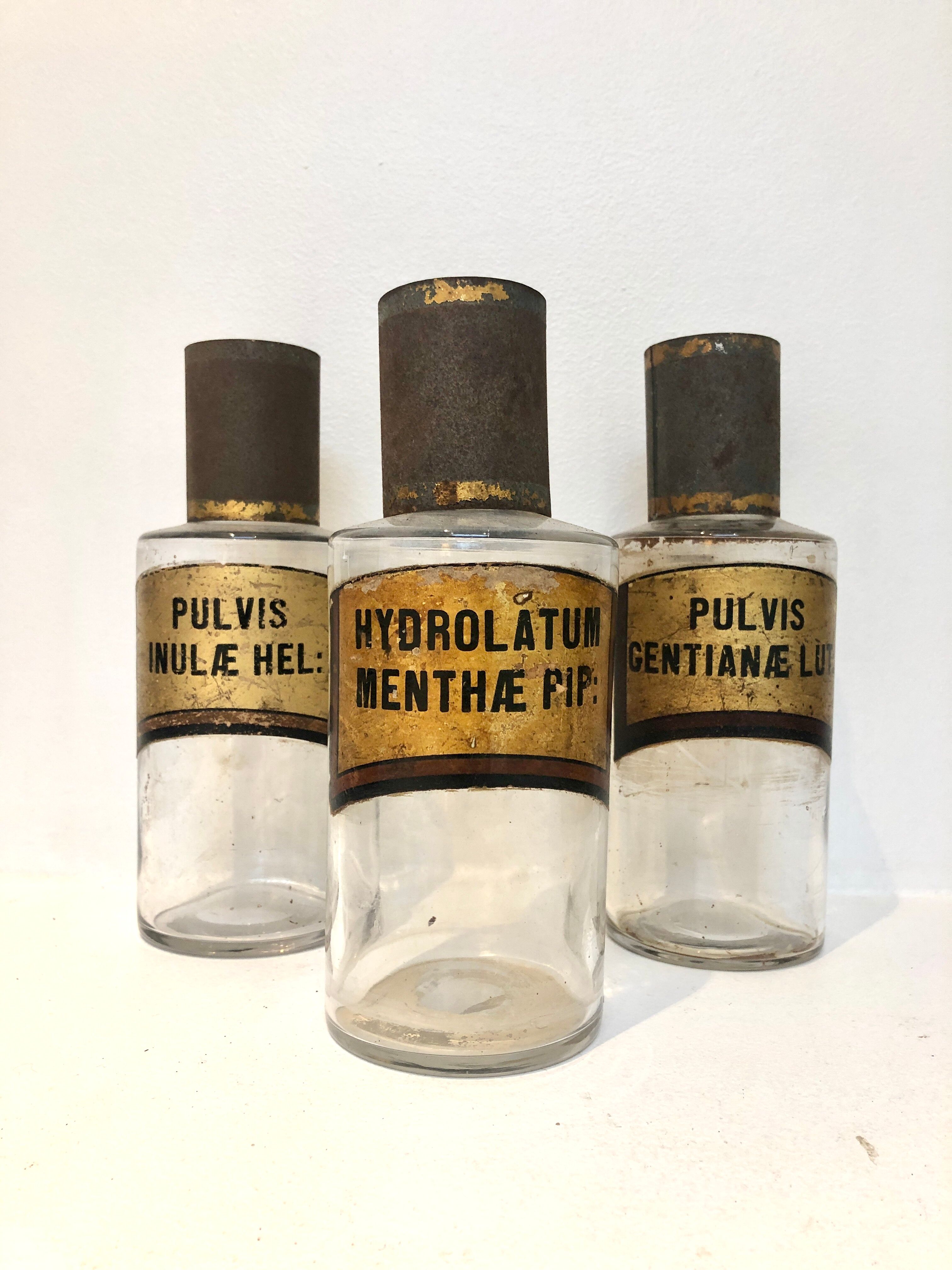 Trio apothecary bottles, early 20th