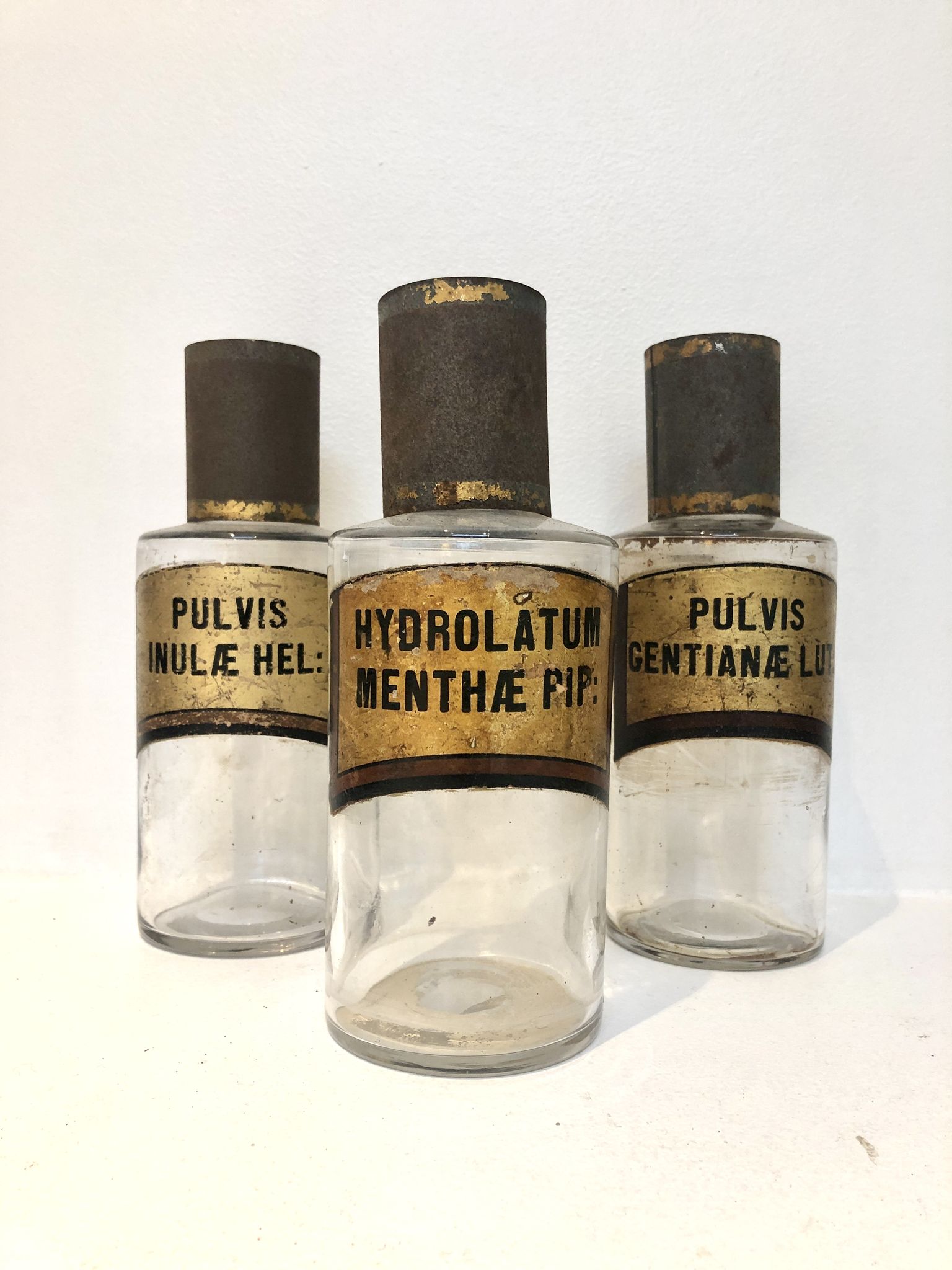 Trio apothecary bottles, early 20th