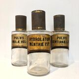 Trio apothecary bottles, early 20th