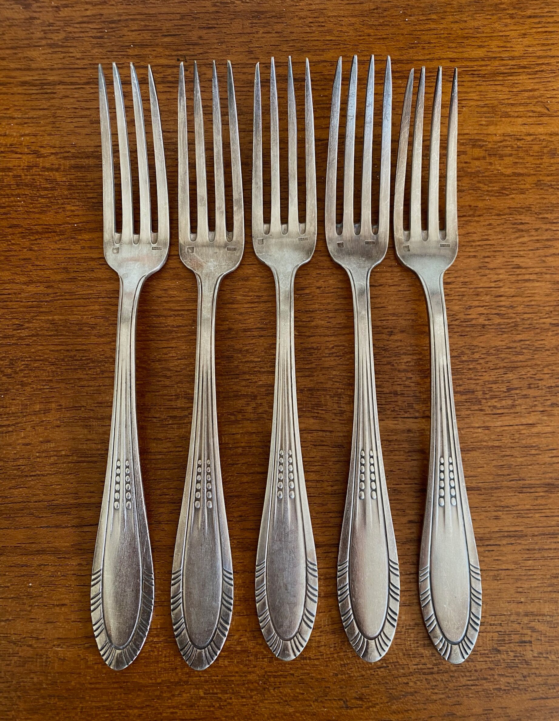 5 antique forks in silver metal